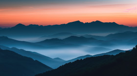 beautiful rocky mountainous landscape orange dawn with sun through