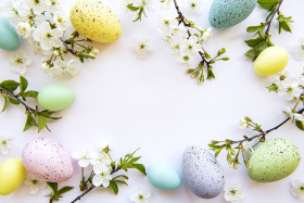 Colorful Easter eggs with spring blossom flowers