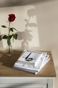 high angle rose and books arrangement