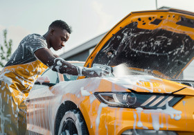 photo portrait cleaning service man washing car